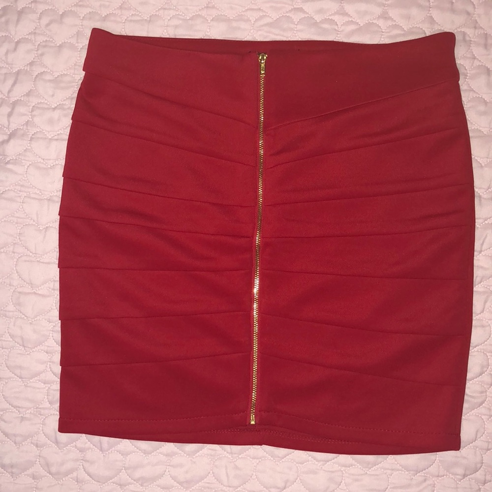 Red “Amisu” mini skirt